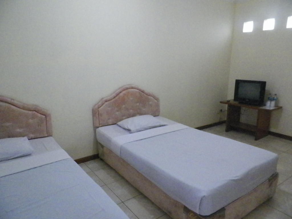 Hotel Puspa Sari Redpartner Чіатер Номер фото