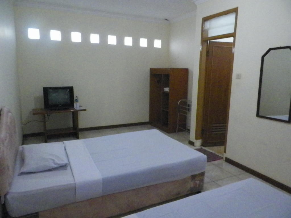 Hotel Puspa Sari Redpartner Чіатер Номер фото